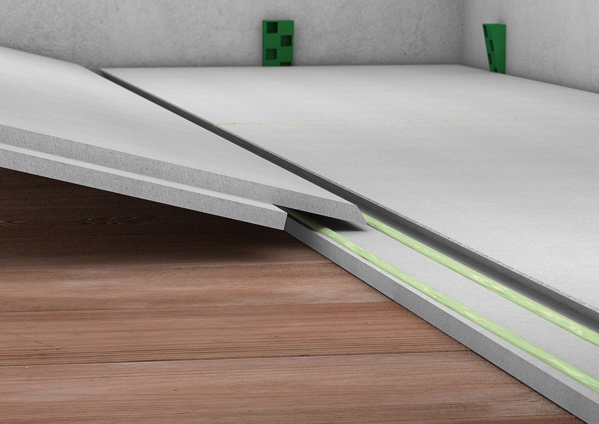 Dosky suchej podlahy sa vzájomne lepia špeciálnym lepidlom.